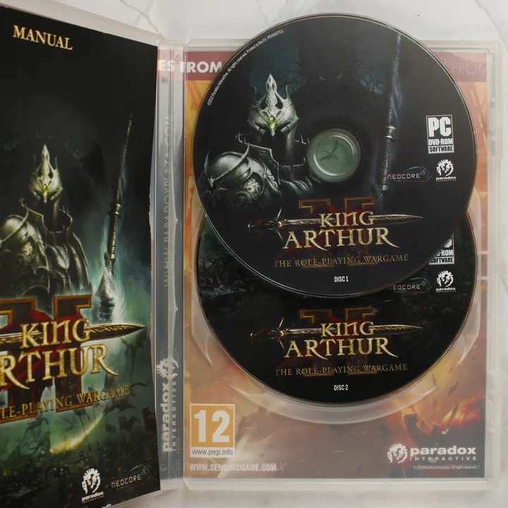 King Arthur II belső tartalom King Arthur II nyitott tok lemezekkel és kézikönyvvel