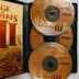 Nyitott tok az Age of Empires III három CD-jével és a kézikönyvvel