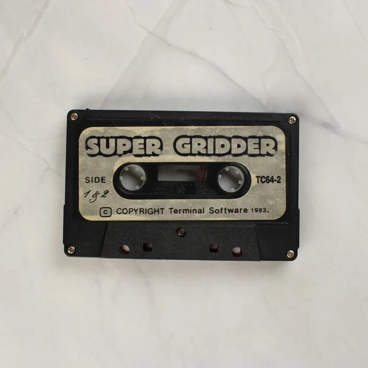 Super Gridder C64 kazetta Super Gridder Commodore 64 adathordozó kazetta