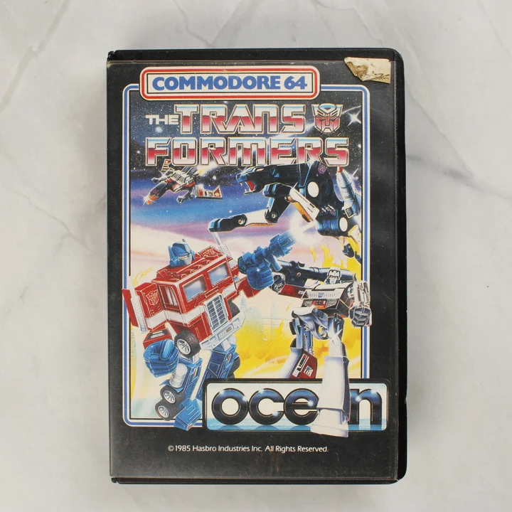 The Transformers C64 előlap The Transformers Commodore 64 videójáték tokjának előlapja