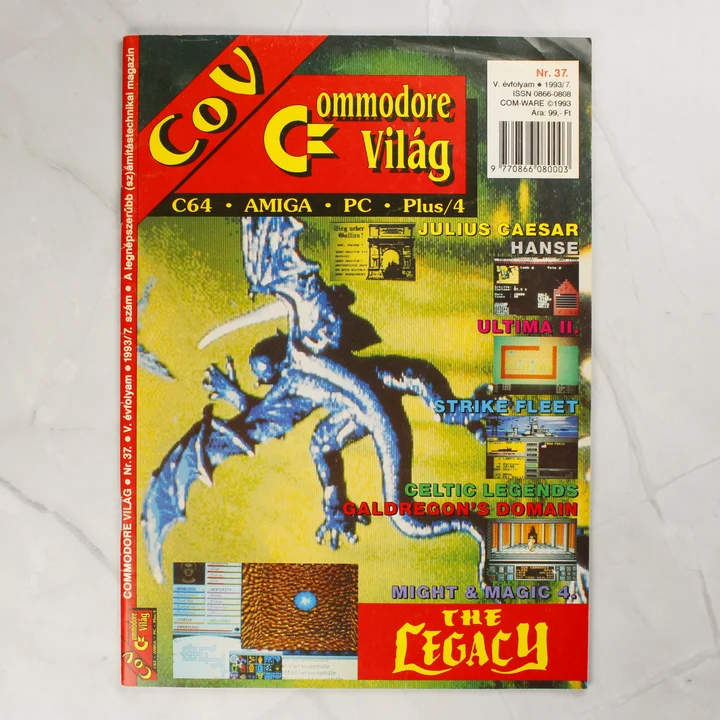 Commodore Világ 37. szám borító A Commodore Világ magazin 37. számának színes borítója egy kék sárkánnyal.