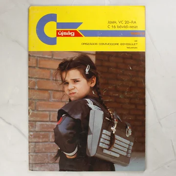 A Commodore Újság 1986/3. számának sárga címlapja egy kislánnyal.