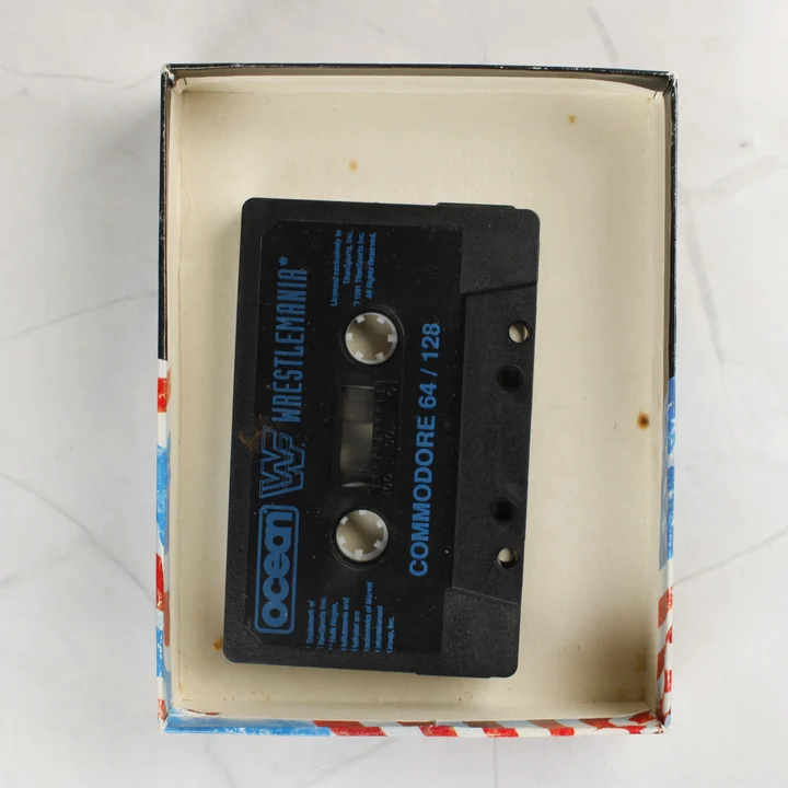 WWF WrestleMania Commodore 64 kazetta a dobozban