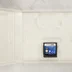 Nyitott Nintendo DS tok a Ben 10 cartridge-dzsel