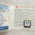Nyitott Nintendo DS tok a Brain Training cartridge-dzsel és kézikönyvvel