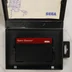 Nyitott Space Harrier játékdoboz a cartridge-dzsel és az útmutatóval