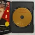 Nyitott DVD tok az aranyszínű lemezzel