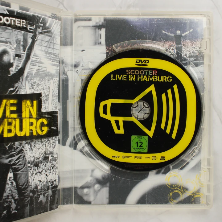 Nyitott DVD tok a Scooter Live in Hamburg lemezzel