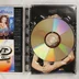 Nyitott Madonna DVD tok a lemezzel és a kiskönyvvel