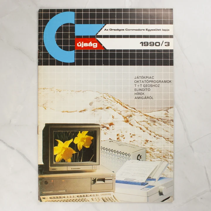 A Commodore újság 1990/3-as számának címlapja egy számítógéppel