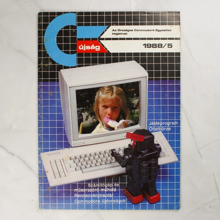 A CK újság 1988/5-ös számának színes borítója egy Commodore számítógéppel és egy robottal.