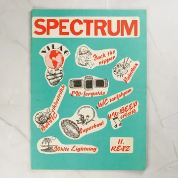 A Spectrum Világ magazin 11. részének türkizkék borítója