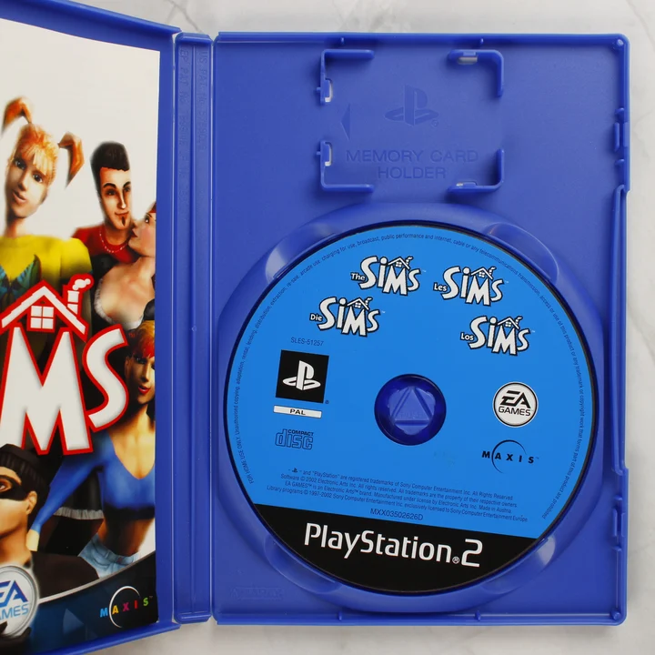 The Sims PS2 belső The Sims PlayStation 2 nyitott tok a lemezzel