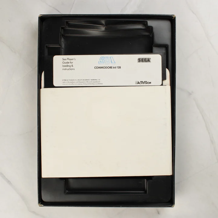SDI Commodore 64 floppy lemez Az SDI videójáték 5,25 colos floppy lemeze a belső tálcában