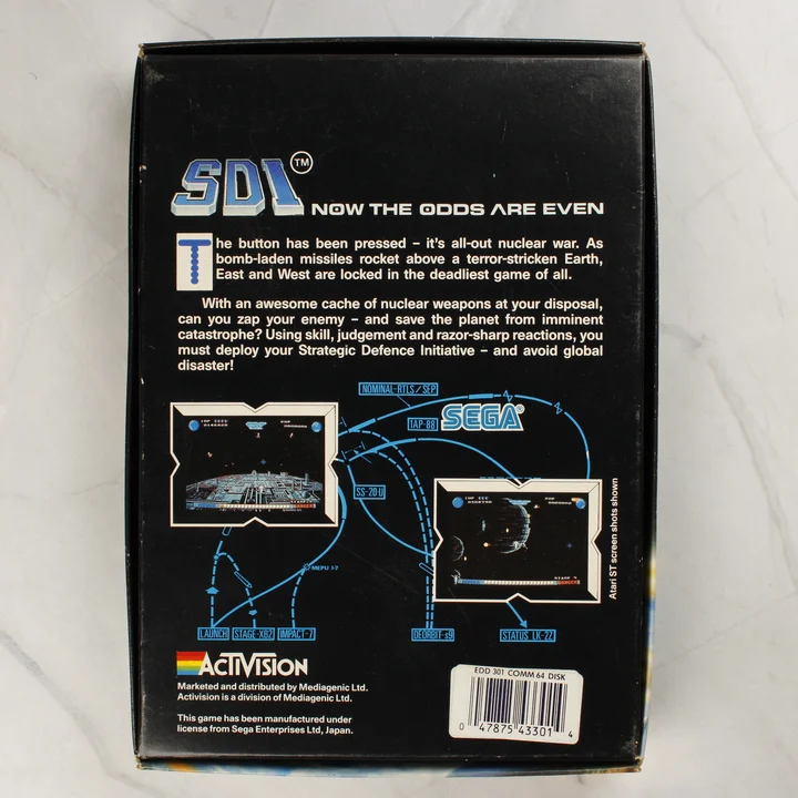 SDI Commodore 64 doboz hátnézet Az SDI videójáték dobozának hátoldala leírással és vonalkóddal