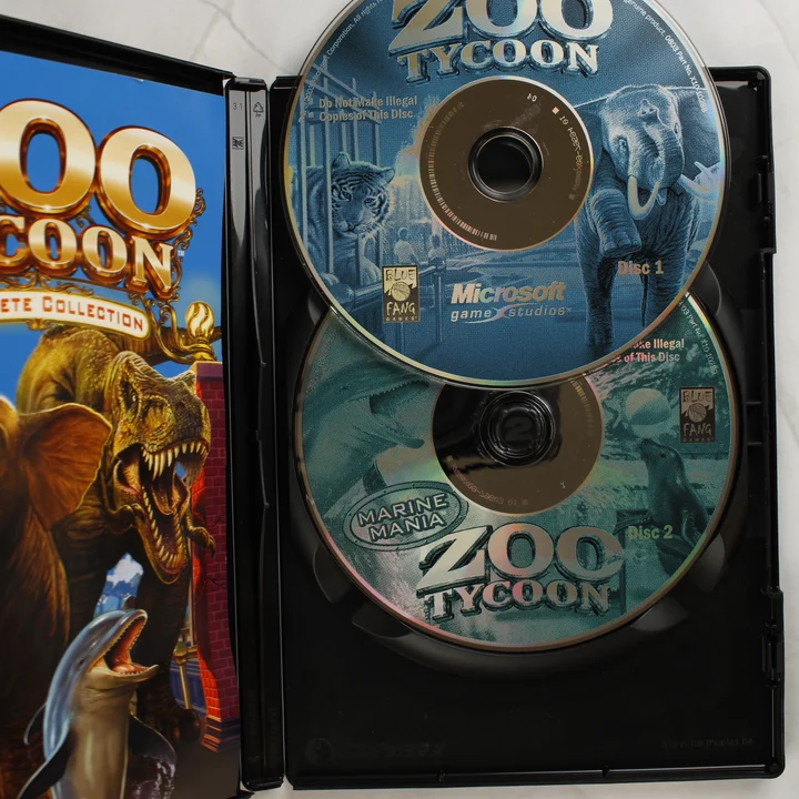 Zoo Tycoon Complete Collection lemezek Zoo Tycoon Complete Collection nyitott tok és lemezek