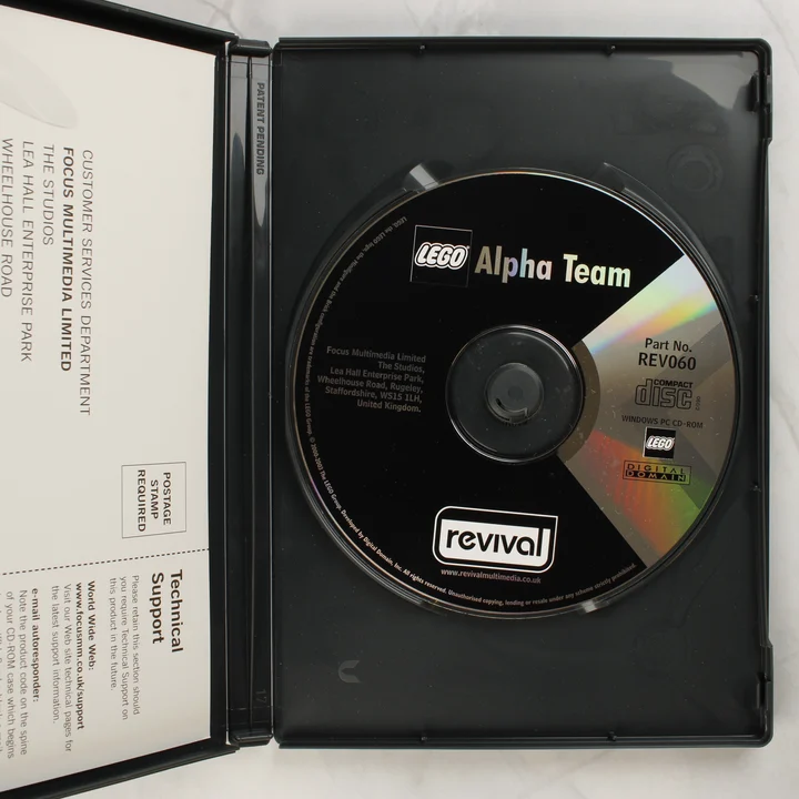 Nyitott LEGO Alpha Team játék tok a CD-vel
