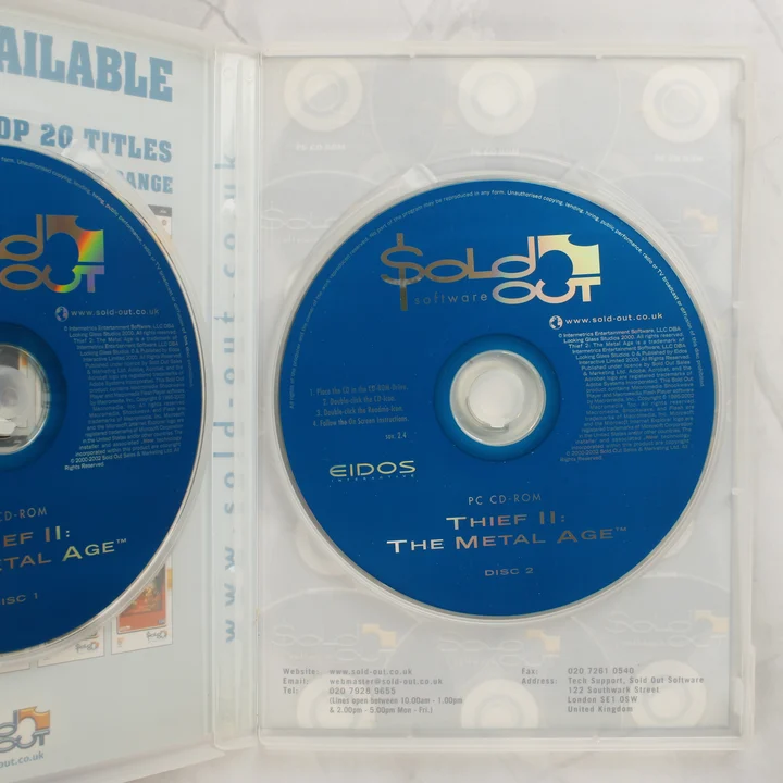 Thief II: The Metal Age nyitott tok és CD-k