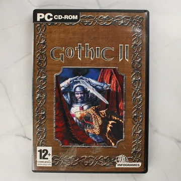 Gothic II PC játék borítója lovaggal és sárkánnyal
