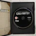 Call of Duty 2 nyitott tok a lemezzel és a kézikönyvvel