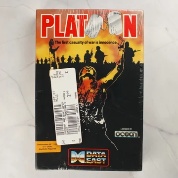 A Platoon videójáték dobozának előlapja Commodore 64-re, rajta egy nagy fehér matricával.