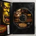 Nyitott Warcraft III tok a CD-ROM lemezzel és a kézikönyvvel