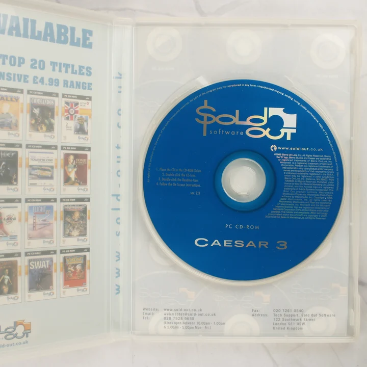 Caesar III lemez Nyitott tok a Caesar III CD-ROM lemezzel