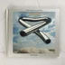 Mike Oldfield Tubular Bells 25. évfordulós kiadásának ezüstszínű borítója