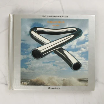 Mike Oldfield Tubular Bells 25. évfordulós kiadásának ezüstszínű borítója