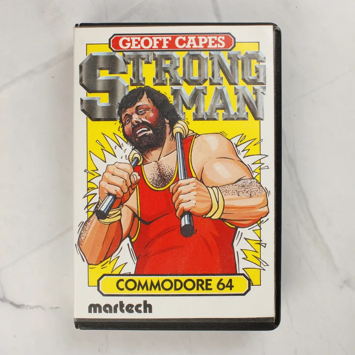 Geoff Capes Strongman C64 borító Geoff Capes Strongman Commodore 64 játék előlapja