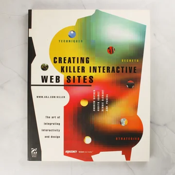 A Creating Killer Interactive Web Sites könyv elülső borítója absztrakt színes grafikával.