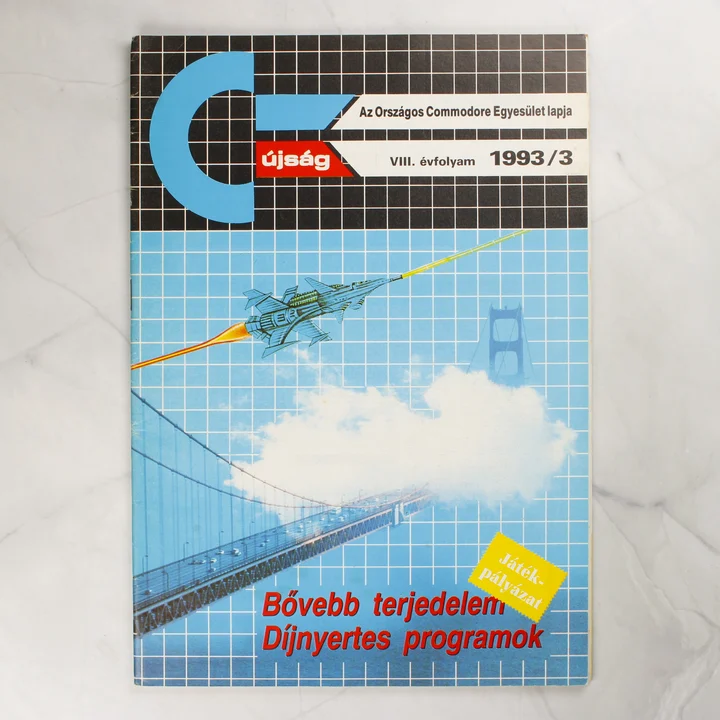 A C-újság 1993/3-as számának színes borítója egy űrhajóval és a Golden Gate híddal.