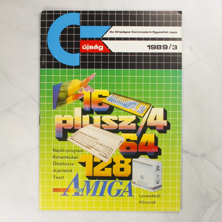 A C-újság 1989/3. számának színes borítója Commodore logóval és grafikával.