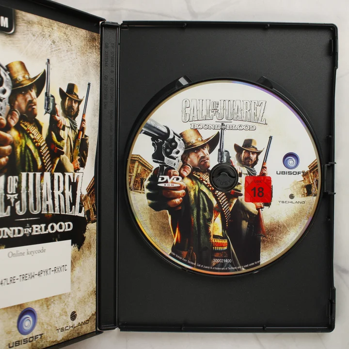Call of Juarez: Bound in Blood PC belső tartalom A nyitott tok a Call of Juarez: Bound in Blood DVD lemezzel és a kézikönyvvel