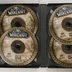 Négy darab World of Warcraft telepítő CD a nyitott tokban