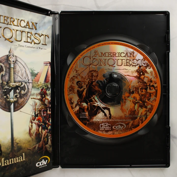 American Conquest belső tartalom American Conquest nyitott tok a lemezzel és kézikönyvvel