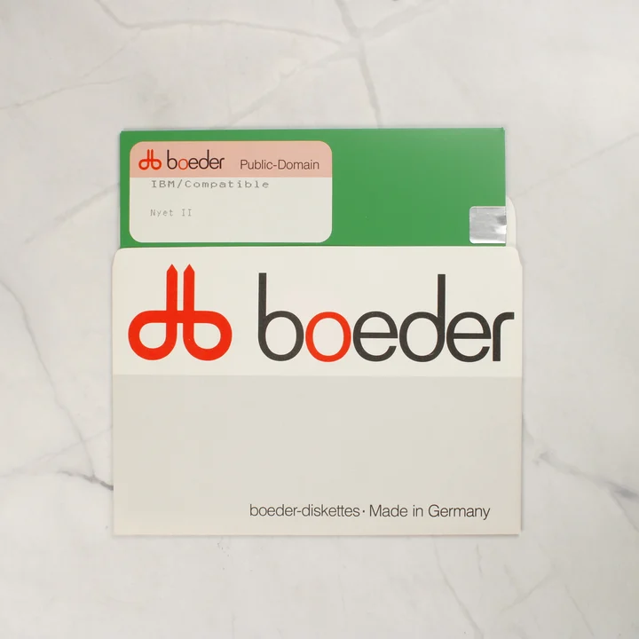 Zöld 5,25 colos floppy lemez a Boeder védőtasakjában