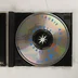 A Strange Angels CD lemez a nyitott tokban