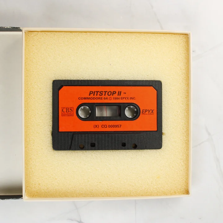 Pitstop II videójáték kazetta a dobozában