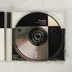 A nyitott tokban lévő Franck CD lemez