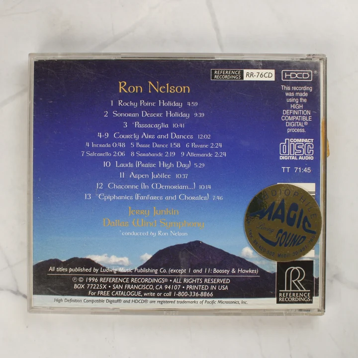 Ron Nelson - Holidays & Epiphanies CD hátlap Ron Nelson - Holidays & Epiphanies CD tok hátoldala a számlistával és matricával