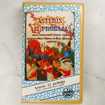 Az Asterix 12 próbája VHS videókazetta elülső borítója a színes illusztrációval és a MOKÉP Video logóval