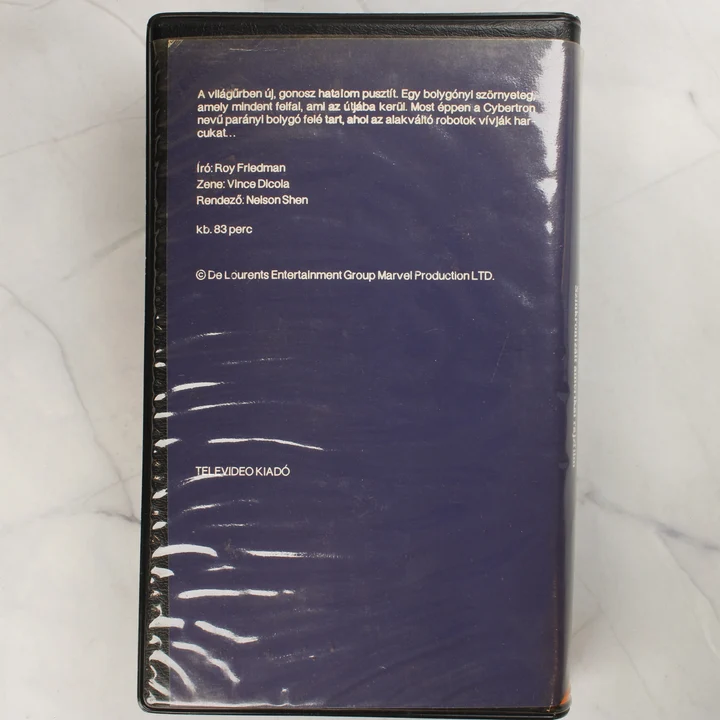 The Transformers: The Movie magyar kiadású VHS kazetta hátlapja a leírással