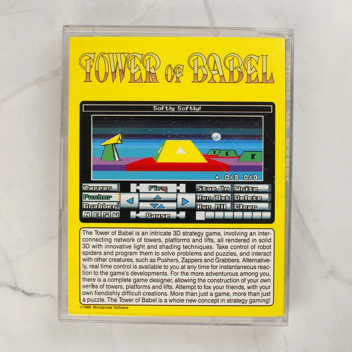 A Tower of Babel Amiga játék tokjának sárga hátlapja leírással és képernyőképpel