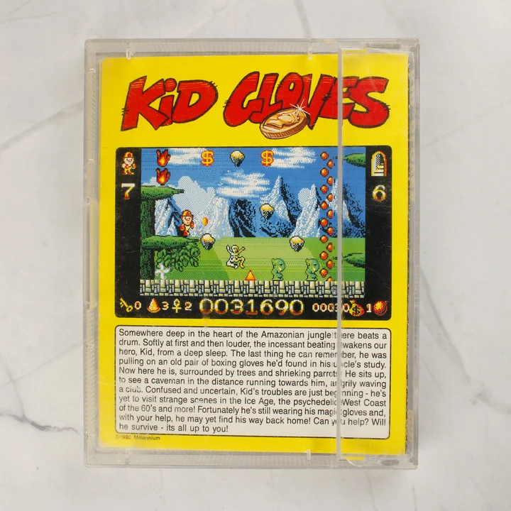 A Kid Gloves Amiga videójáték hátlapi borítója leírással és képernyőképpel