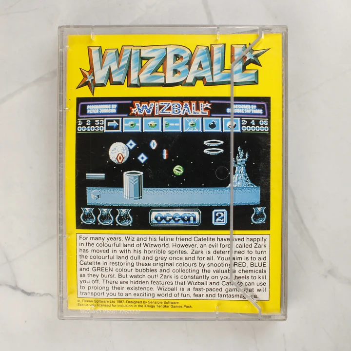 A Wizball Amiga videójáték műanyag tokjának hátlapja a sárga ismertetővel