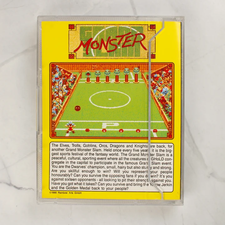 A Grand Monster Slam Amiga videójáték hátlapi borítója leírással és képernyőképpel