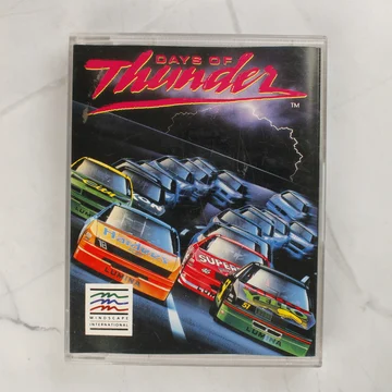 A Days of Thunder Amiga videójáték tokjának előlapja színes versenyautós grafikával