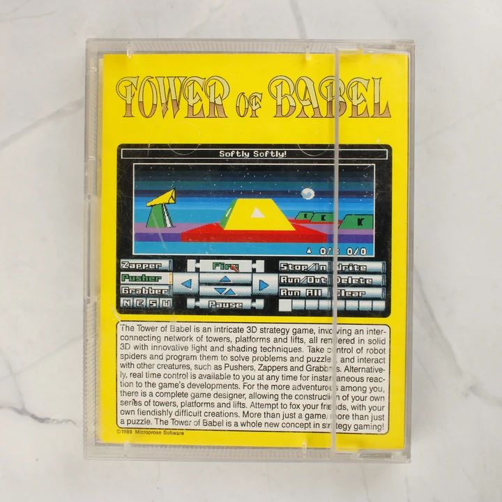 A Tower of Babel Amiga játék tokjának sárga hátlapja leírással és képernyőképpel
