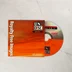 Unidisc Starter CD 1 lemez a narancssárga papírtokból félig kihúzva